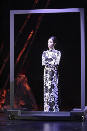 Trapped between the world of the living and the world of the dead – the ghost of Oanh Ganley (Elise Dinh) in the world premiere of East West Players' CHRISTMAS IN HANOI. Photo courtesy of Michael Lamont. 