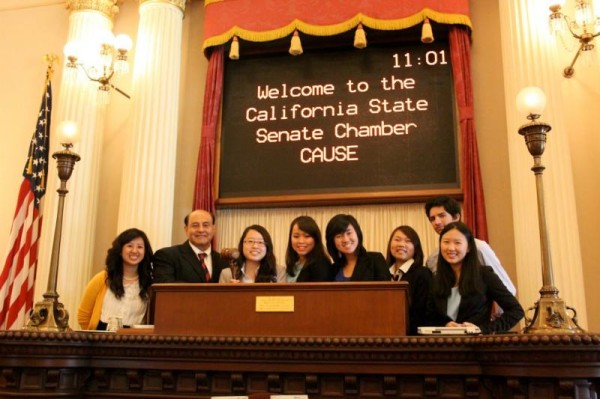 Leadership Academy interns tour the California Senate Chamber with Senator Lou Correa