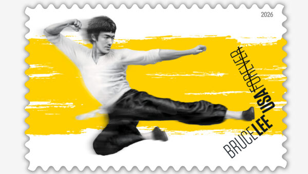 USPS stamp honoring Bruce Lee showing him doing a flying kick